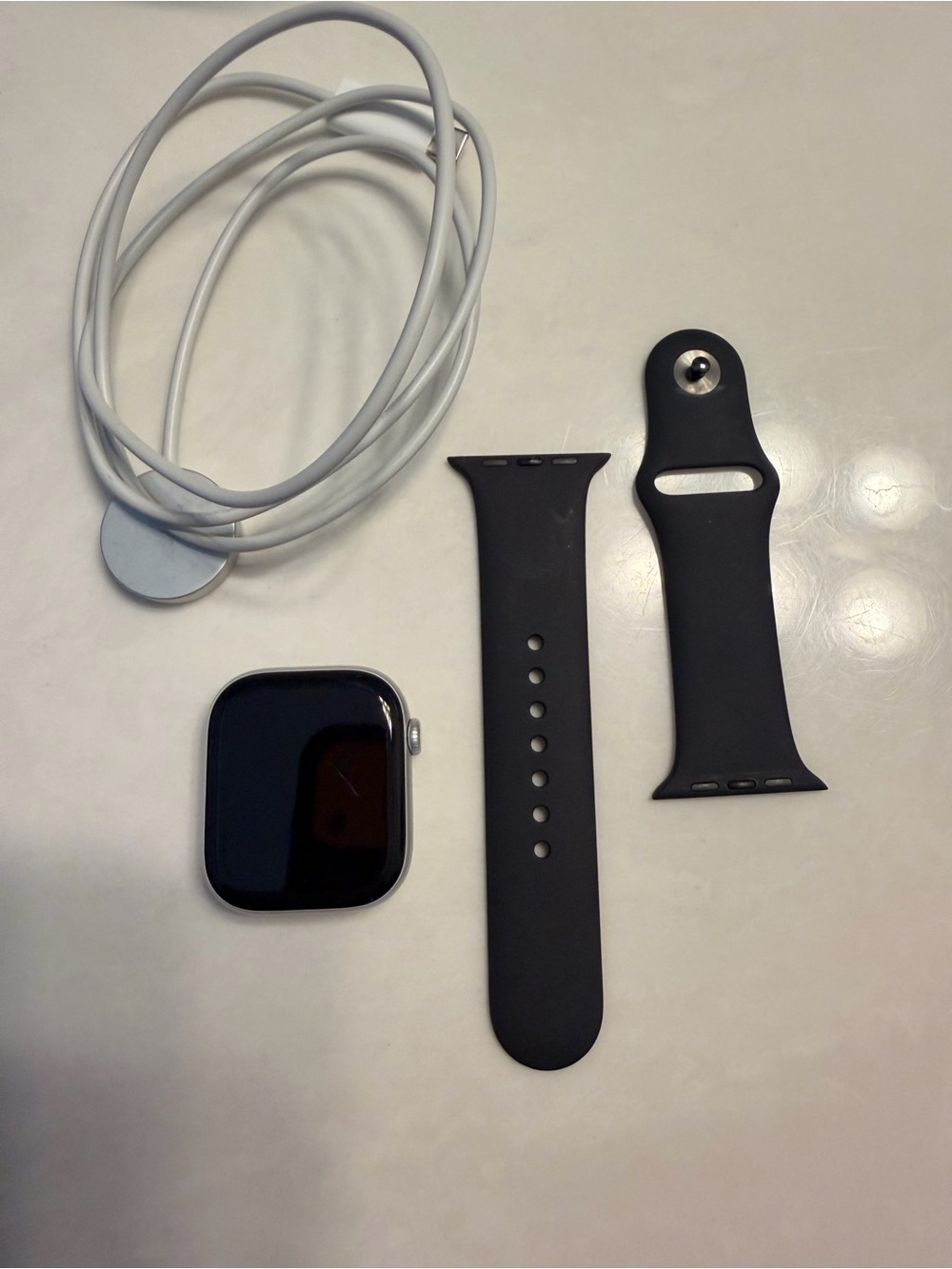 Series 10 silver apple watch with charger face has scratch